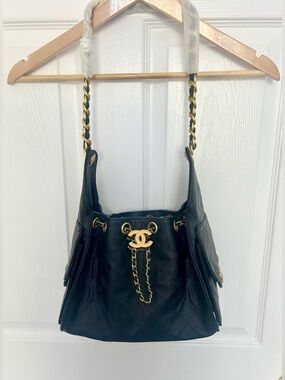 Black Quilted Leather Drawstring Shoulder Bag with Gold CC Accent